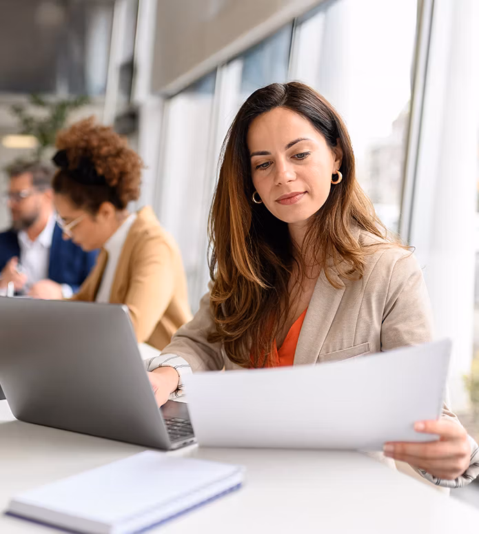 mid-tier-firm-lady-working-at-laptop